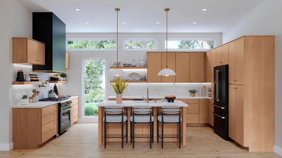 Waypoint 530 kitchen in Maple Cider with flat-panel wood cabinets and an island.